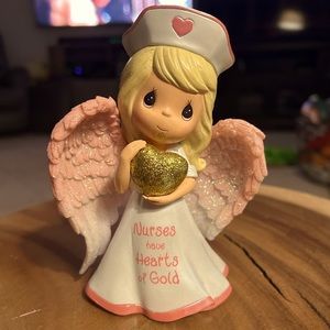 Precious moments “nurses have a heart of gold  figutingu